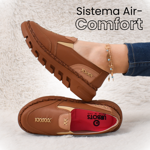 Mocasines Bellami de cuero marrón, con costuras decorativas, paneles beige y suela gruesa con canales de ventilación.